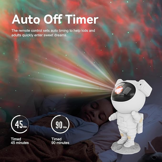 Astronaut galaxy projector night light with colorful nebula and star projection effects.