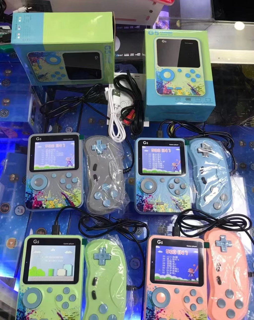 Retro handheld gaming console connected to television with controller