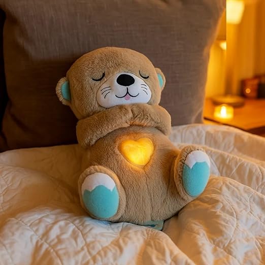 Soft plush teddy bear with glowing heart night light for bedtime comfort and relaxation.