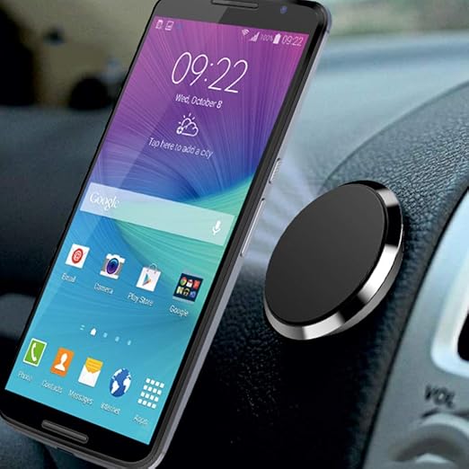 Strong magnetic car phone holder mounted on dashboard, providing secure smartphone support for navigation, hands-free calls, and safe driving.